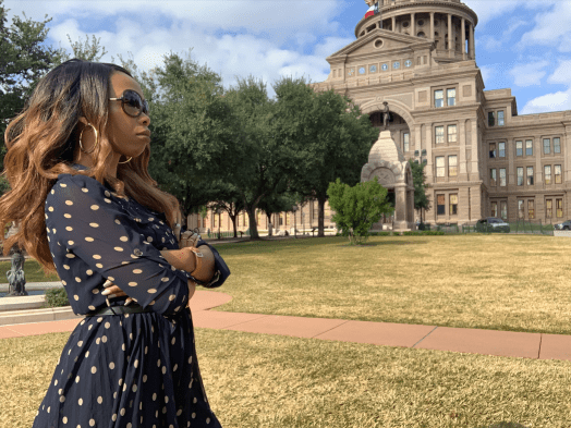Eronn Puan in front of the Texas State Capitol building November 2018